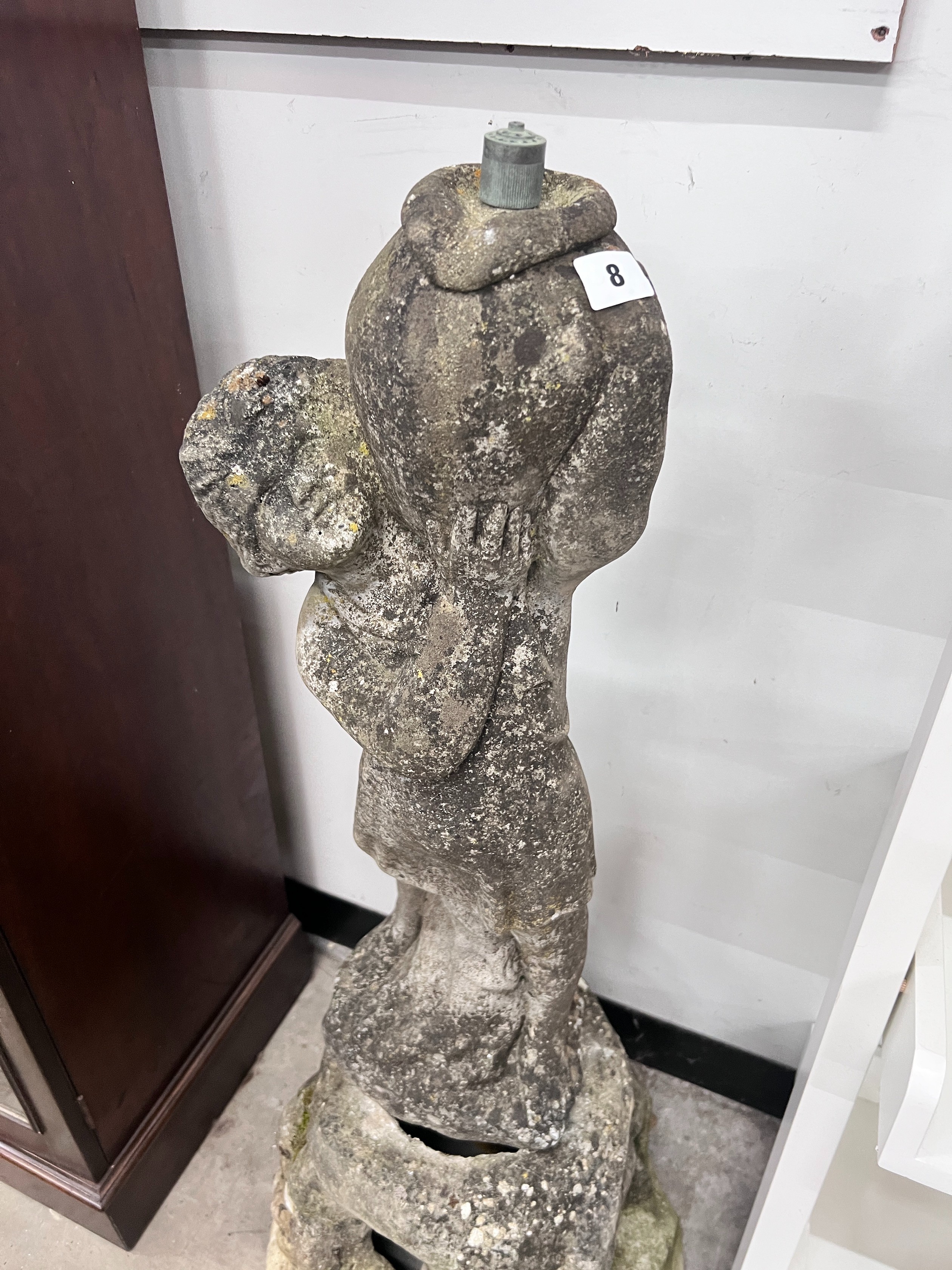 A reconstituted stone figural garden fountain, height 102cm *Please note the sale commences at 9am.